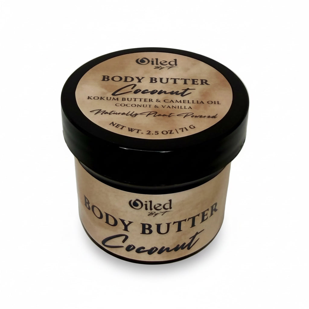 2 oz jar of body butter with coconut scent labeled 'Oiled by T' on a white background