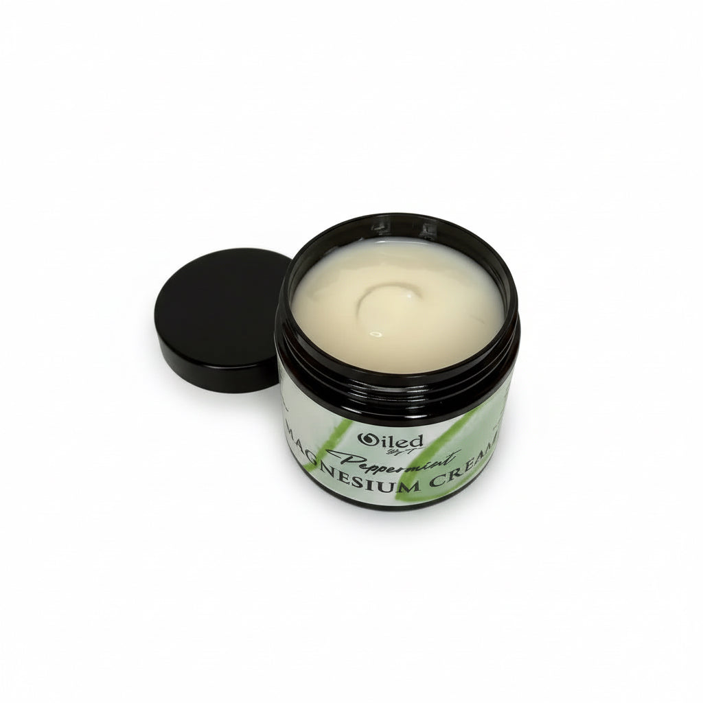 Jar of cream with a black lid on a white background