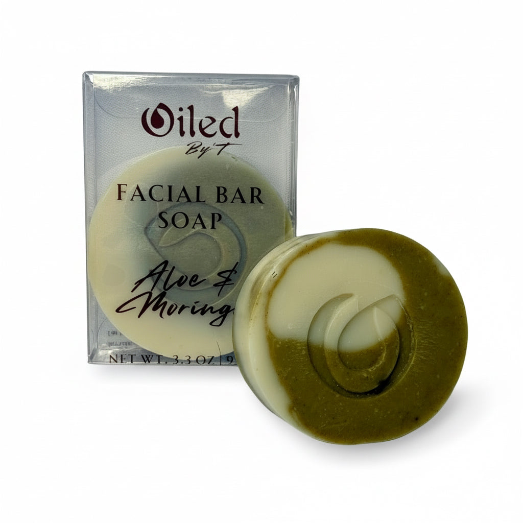 Facial bar soap with 'Oiled by T' packaging on a light gray background