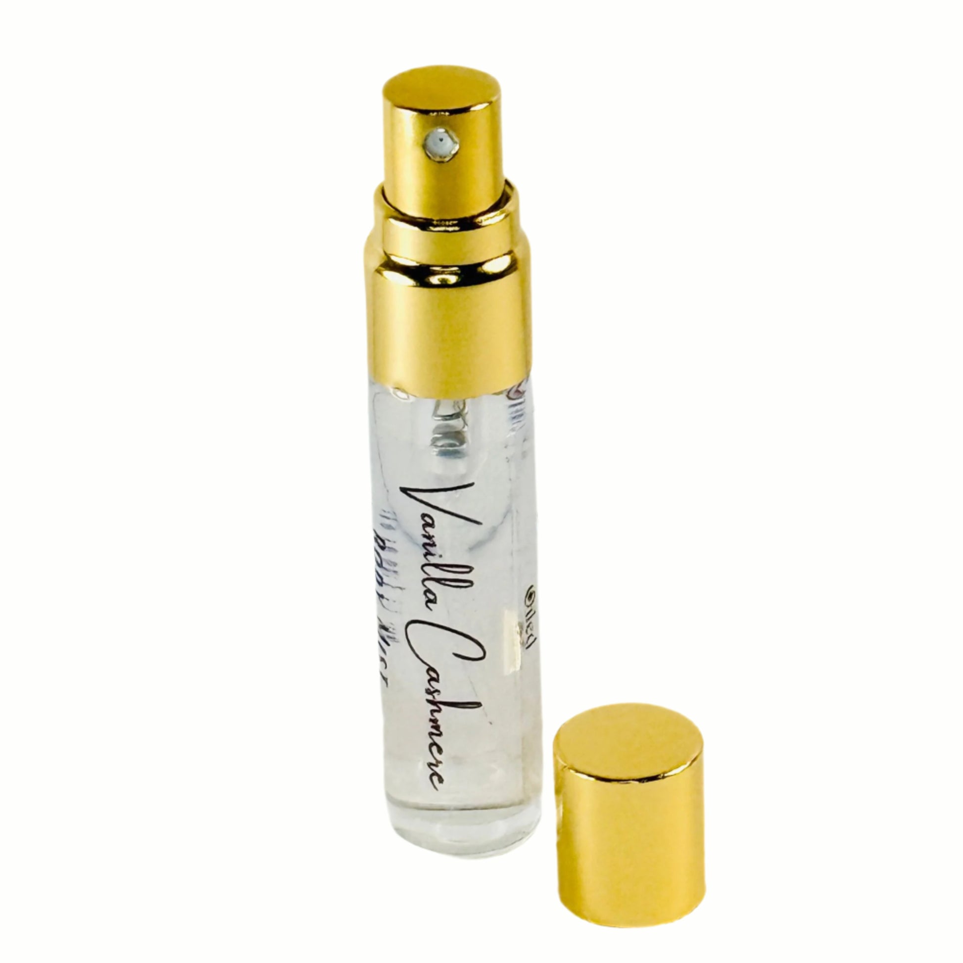 Vanilla Cashmere perfume bottle with gold cap and base on a white background