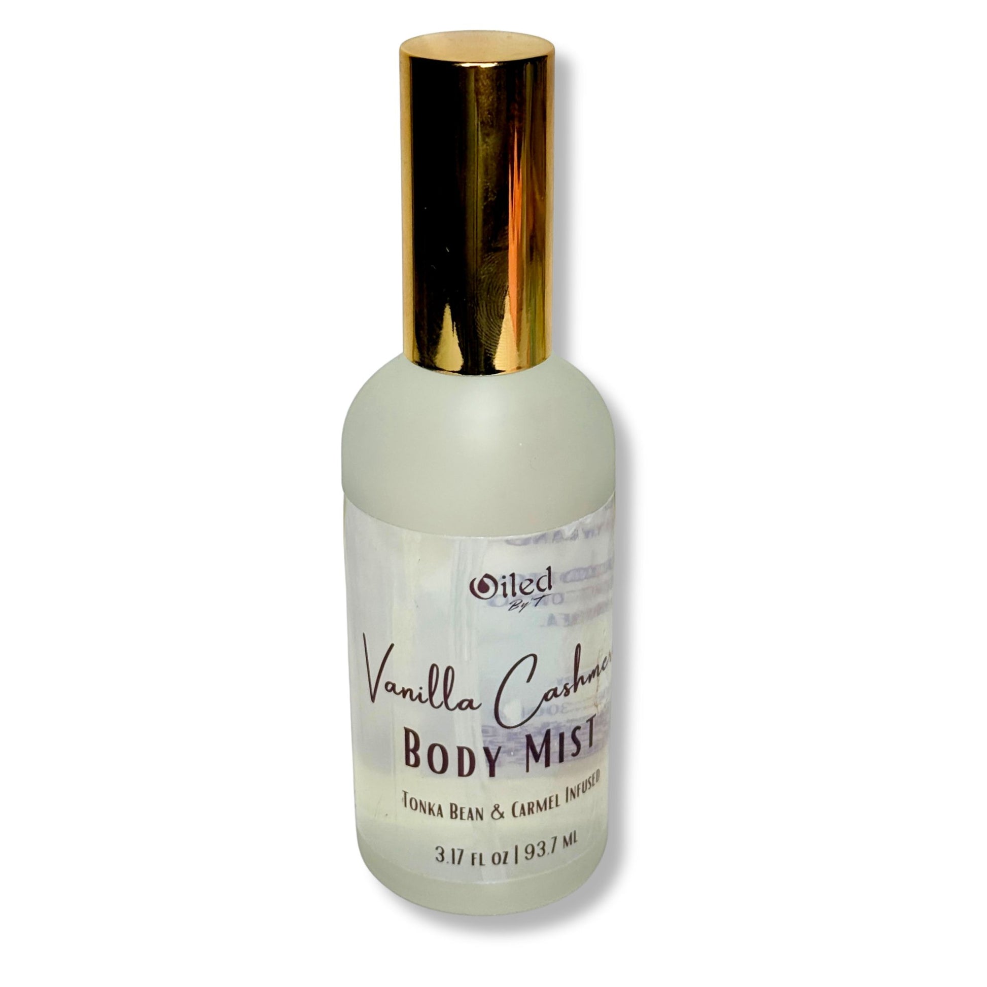 Vanilla Cashmere Body Mist bottle with gold cap on a white background