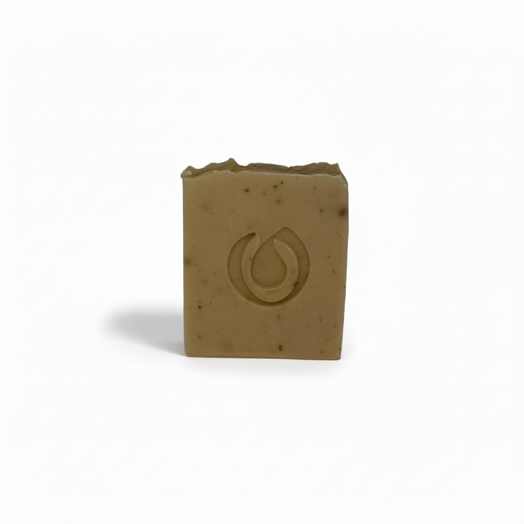 Bar of soap with a logo on a white background