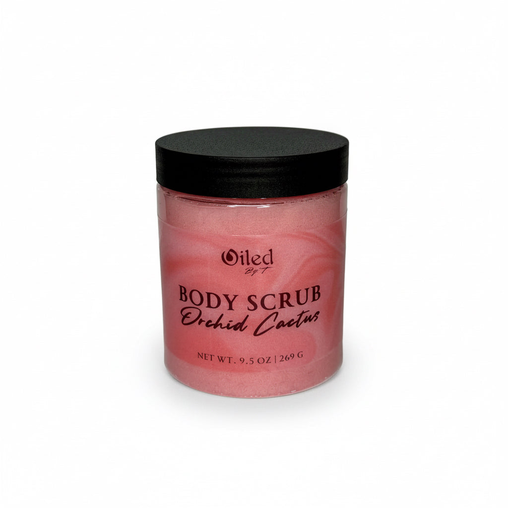 Jar of pink body scrub with black lid on a white background