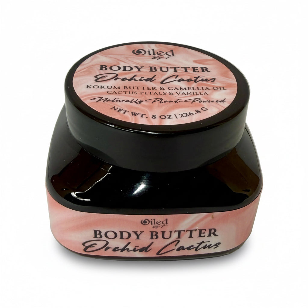 Jar of body butter with pink label on a white background
