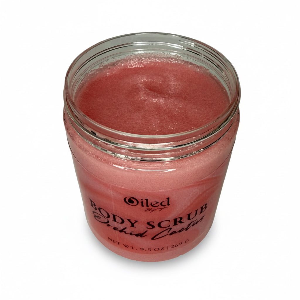 Jar of pink body scrub labeled 'Oiled' on a white background