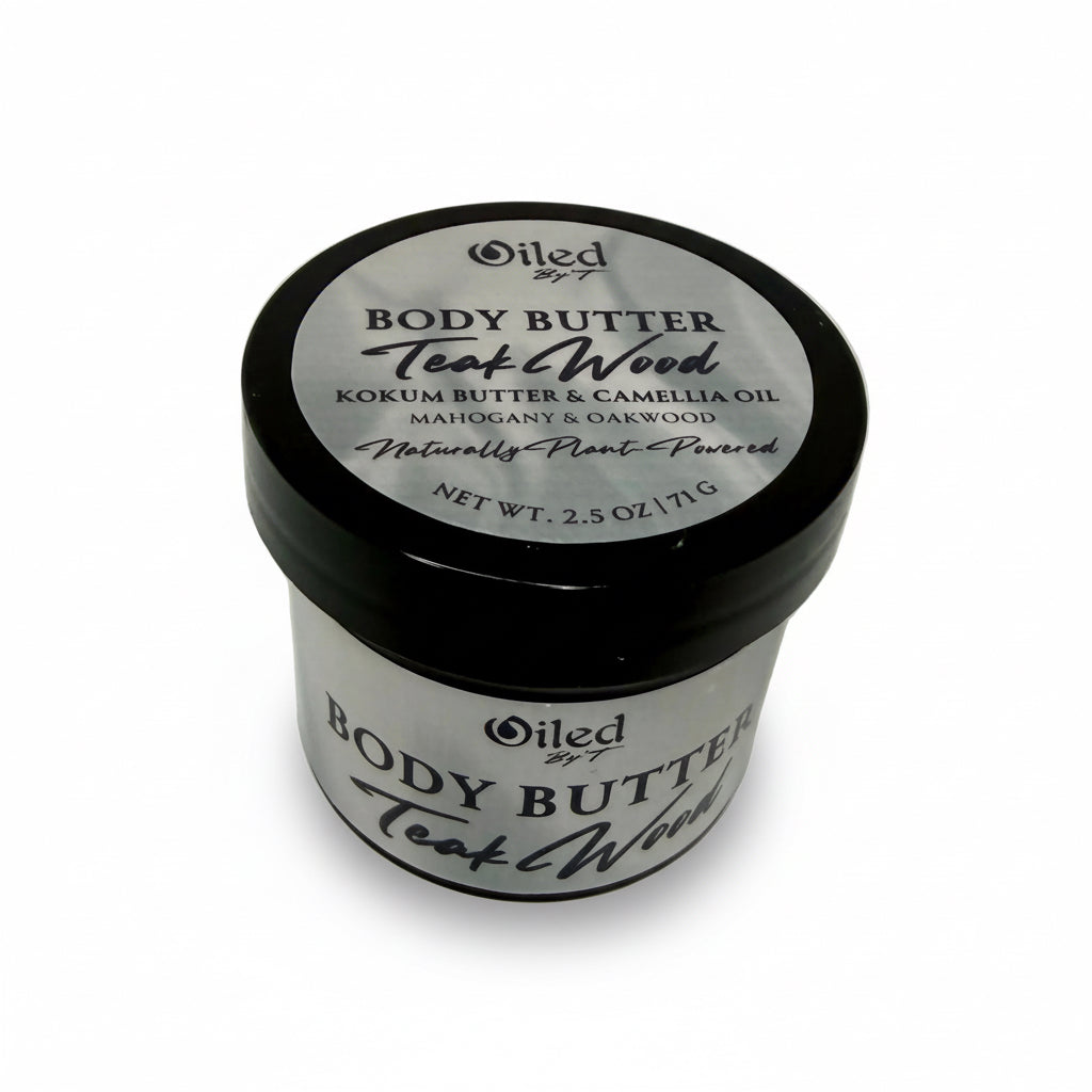 2oz Jar of body butter labeled Oiled By'T with Teakwood scent on a white background
