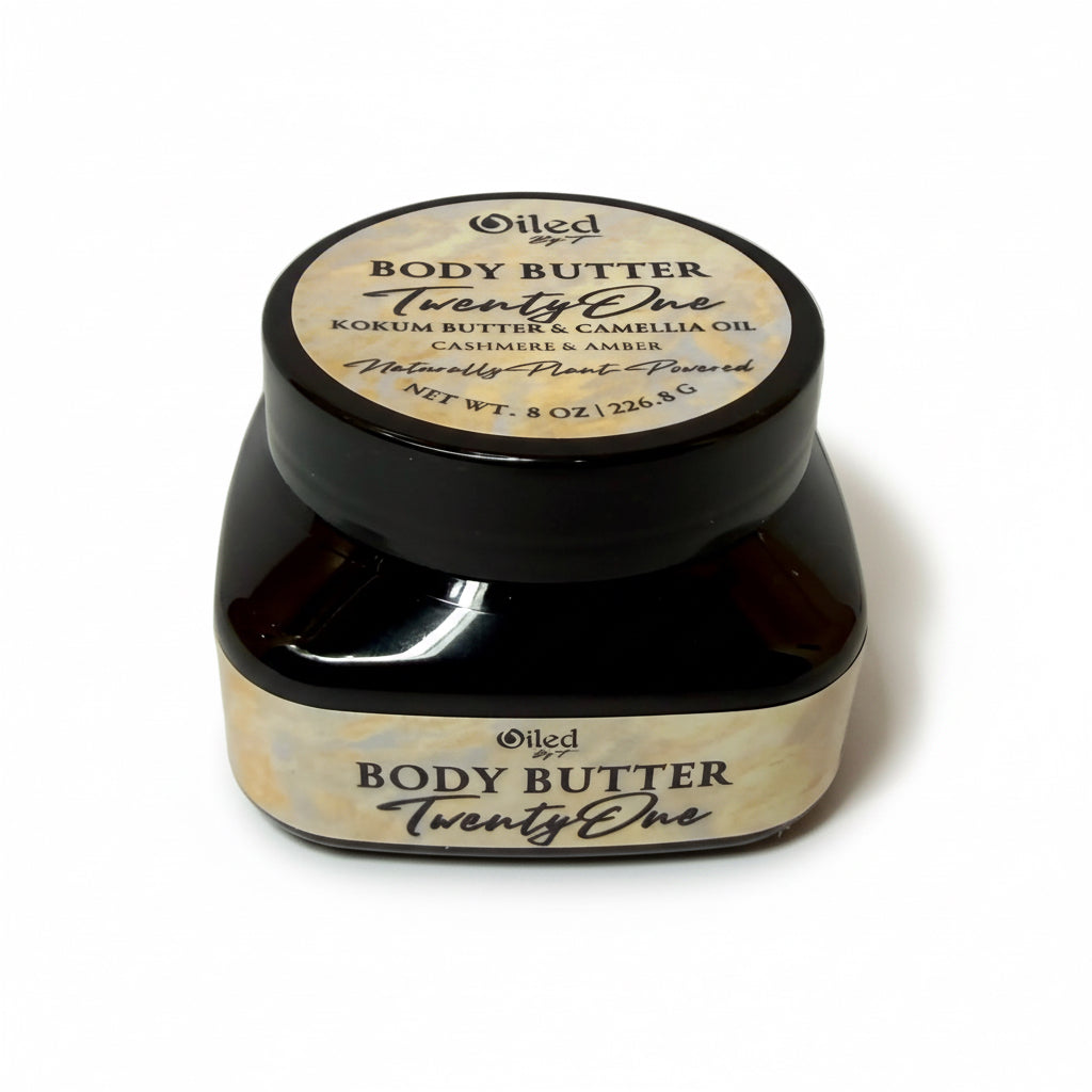 8oz Jar of body butter with a black lid on a white background