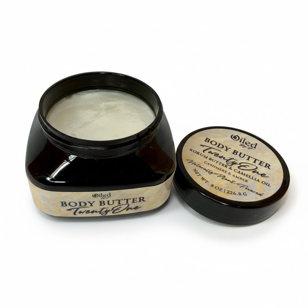 8oz Body butter jar opened with lid on a white background