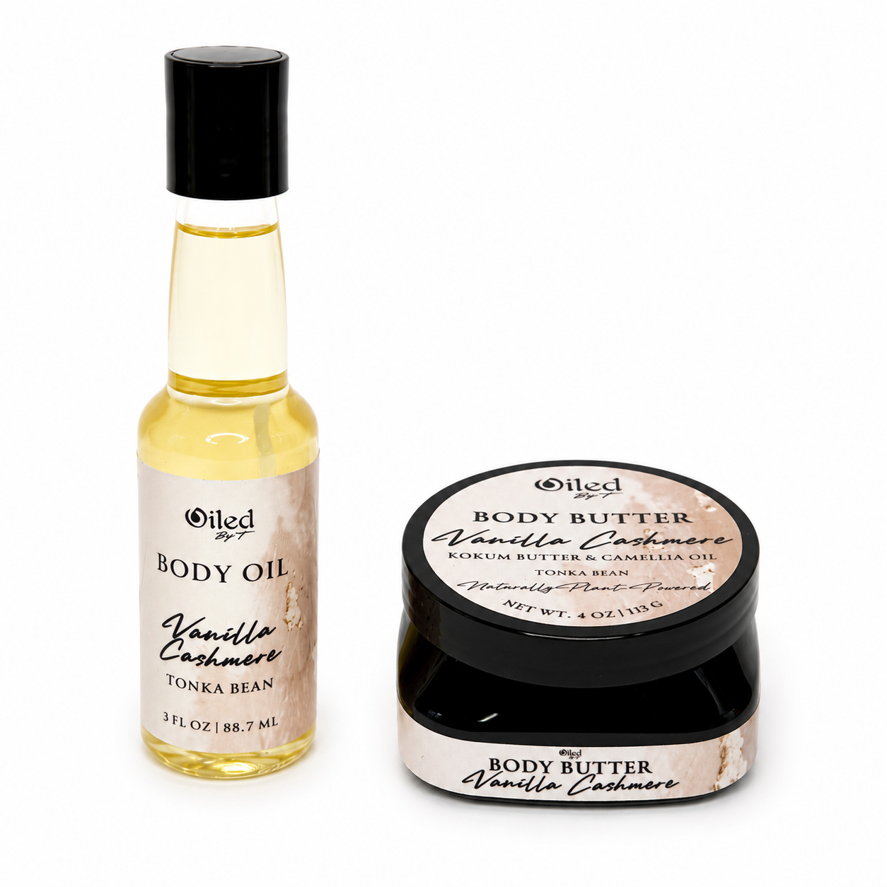 Oiled By'T Vanilla Cashmere body oil and body butter set on a white background